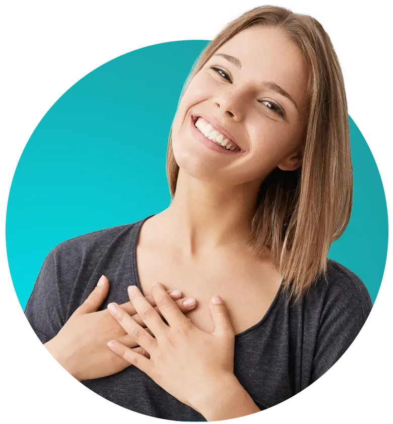 Woman smiling with hands on chest